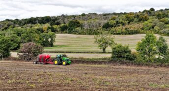 A tractor in a field in the London Green Belt