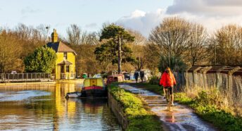 Towpath along the River Lea with moored canal boats