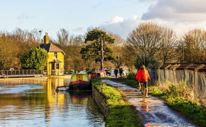 Towpath along the River Lea with moored canal boats