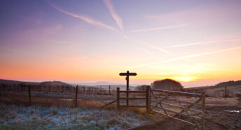 A frosty winter sunrise over the Ridgeway long distance path in Wiltshire