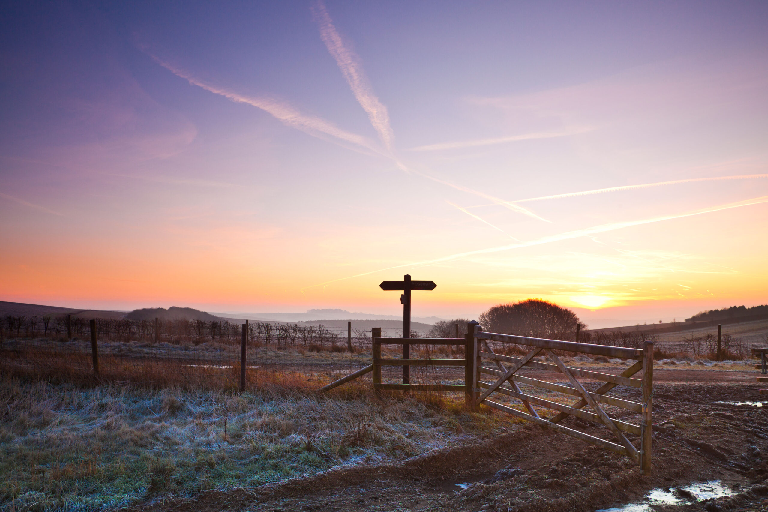 A frosty winter sunrise over the Ridgeway long distance path in Wiltshire