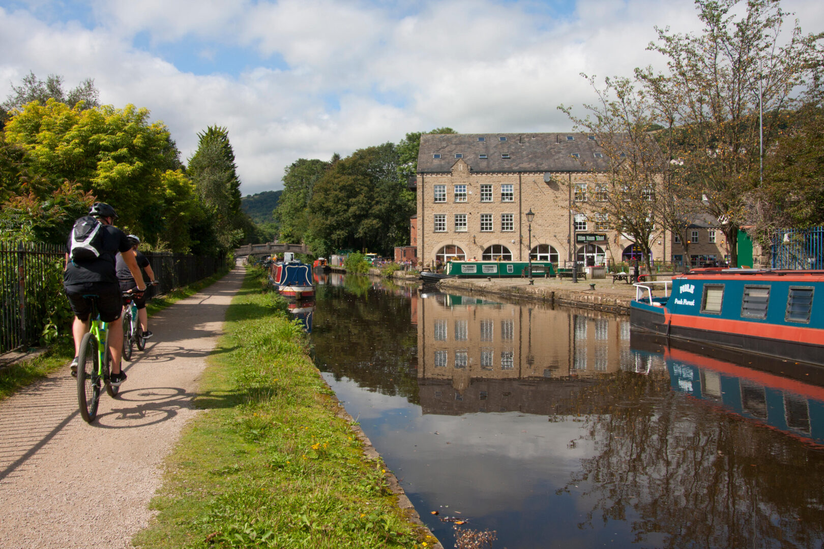 Cyclists on the towpath at Hebden Bridge