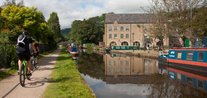 Cyclists on the towpath at Hebden Bridge