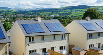 Solar panels on rooftops of new housing in Cumbria