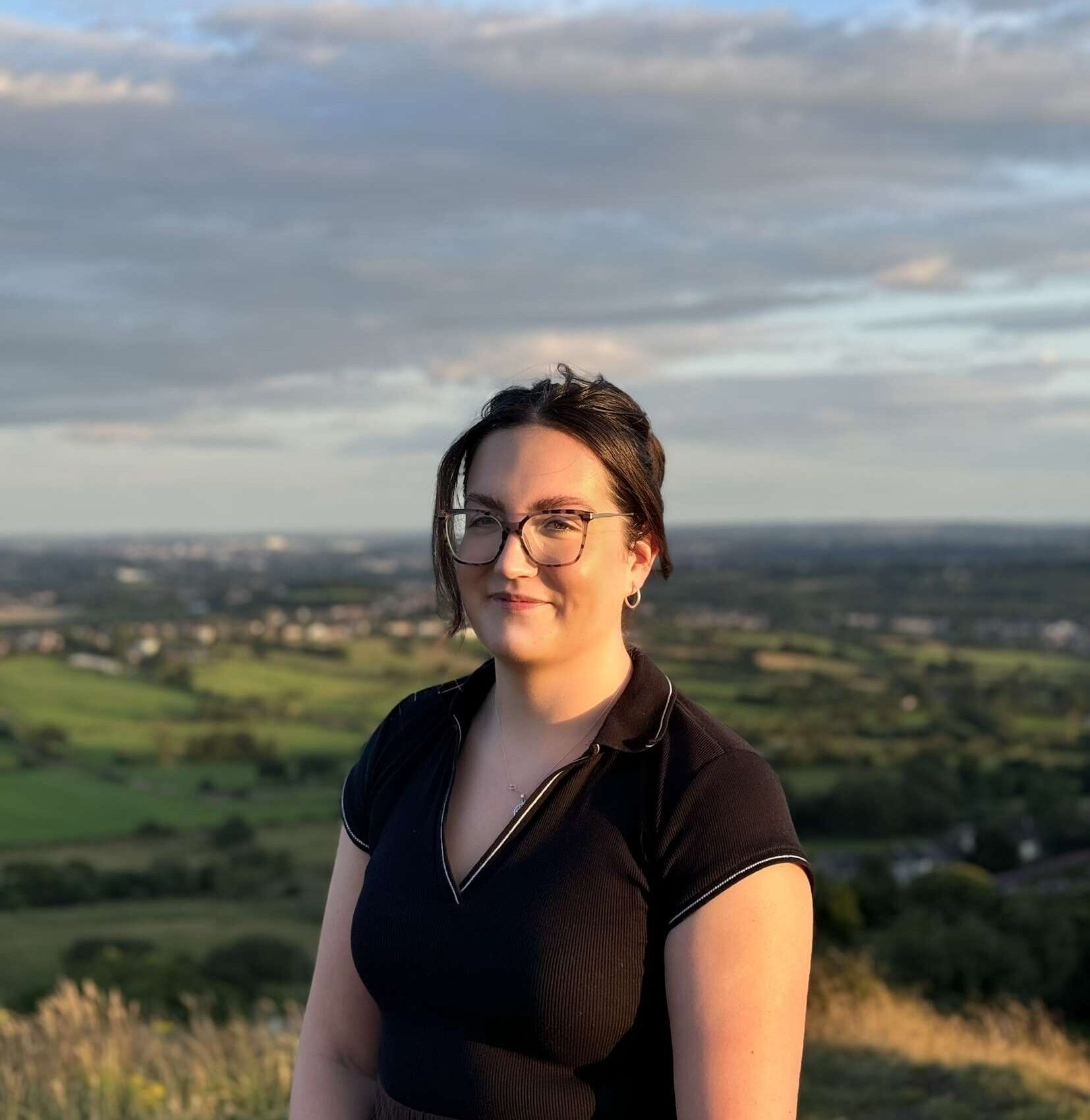 Photo of Jess Parry in the countryside