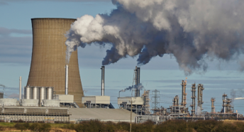 Photo of a power station and gas being emitted