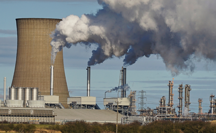 Photo of a power station and gas being emitted