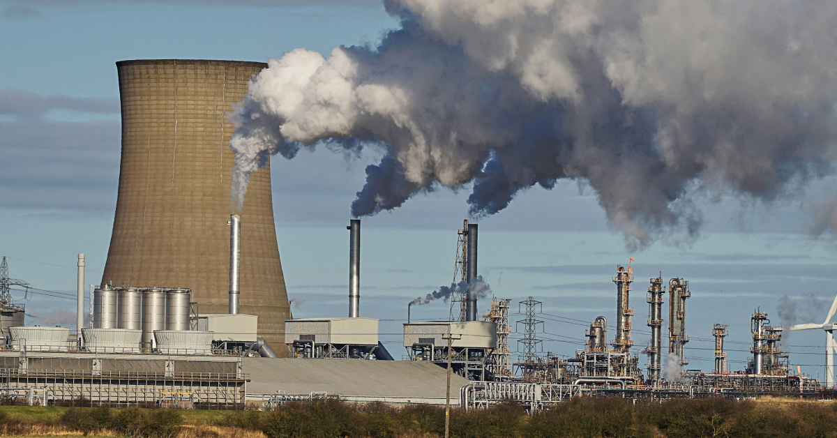 Photo of a power station and gas being emitted
