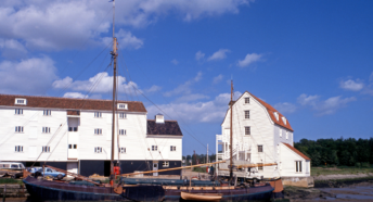photo of boats and a mill