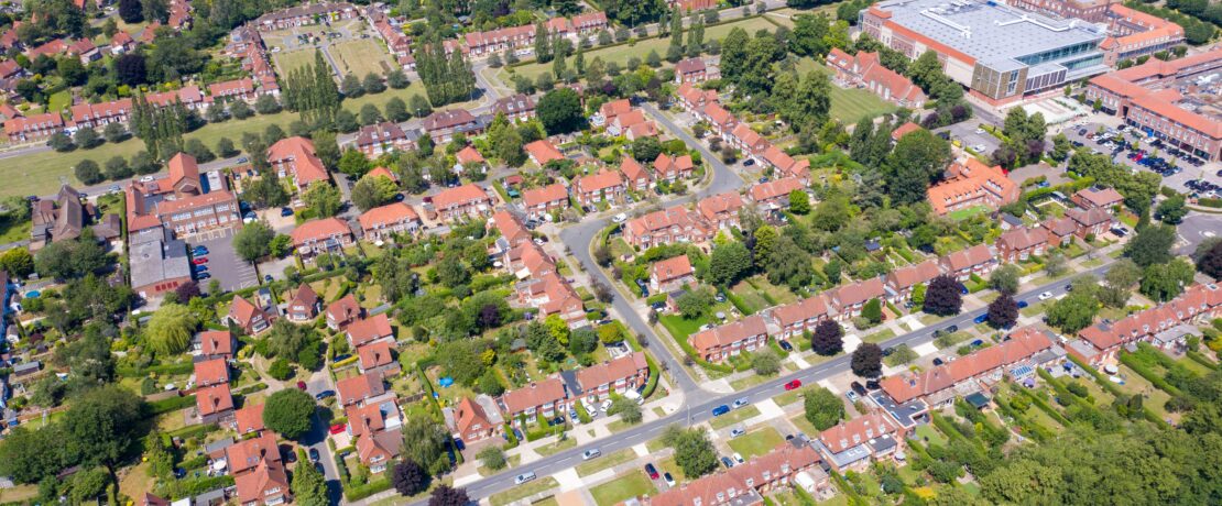 Aerial photo of the British town of Stevenage in Hertfordshire UK showing a typical British housing estate with rows of houses in the village