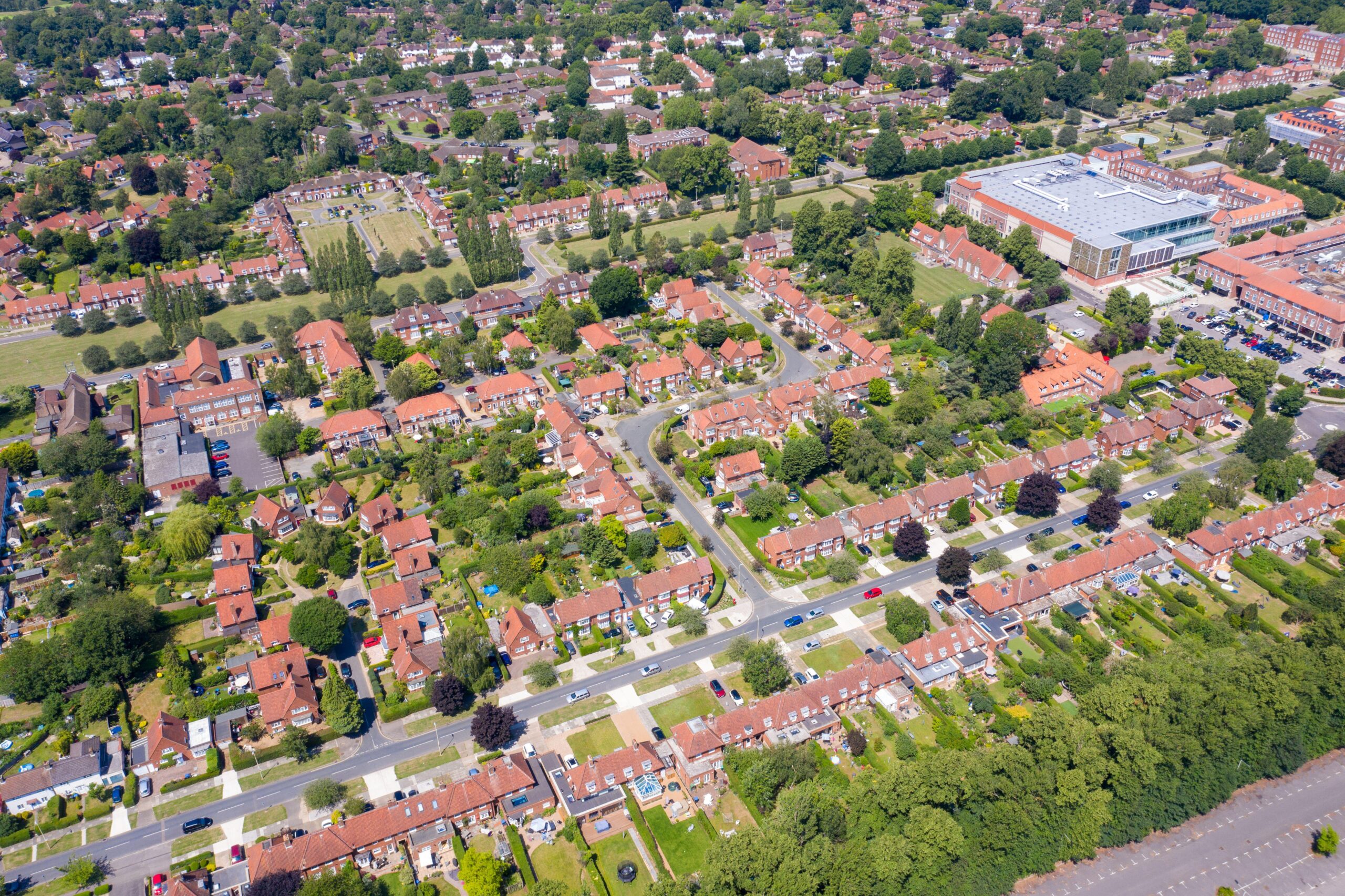 Aerial photo of the British town of Stevenage in Hertfordshire UK showing a typical British housing estate with rows of houses in the village