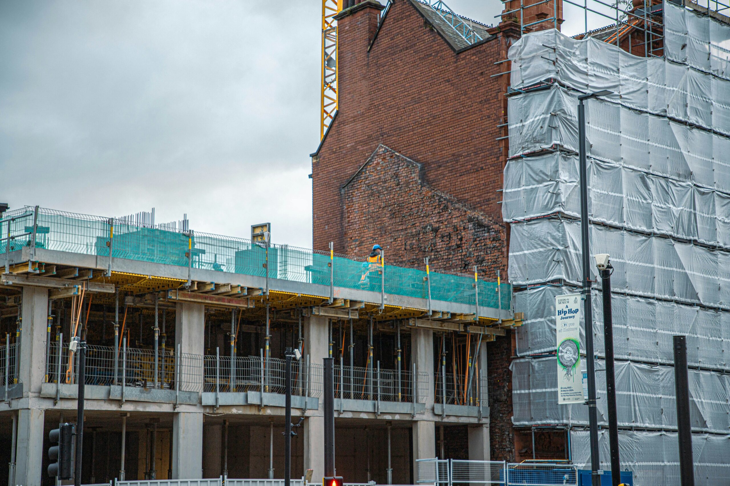 A building under construction with scaffolding around it