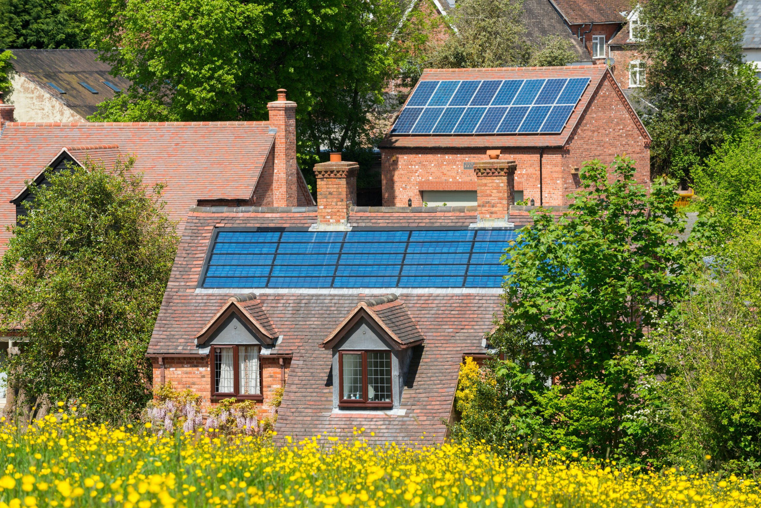 Photovoltaic panels on buildings in Cleobury Mortimer, Shropshire, England, UK.