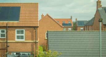 Houses with solar panels on roof