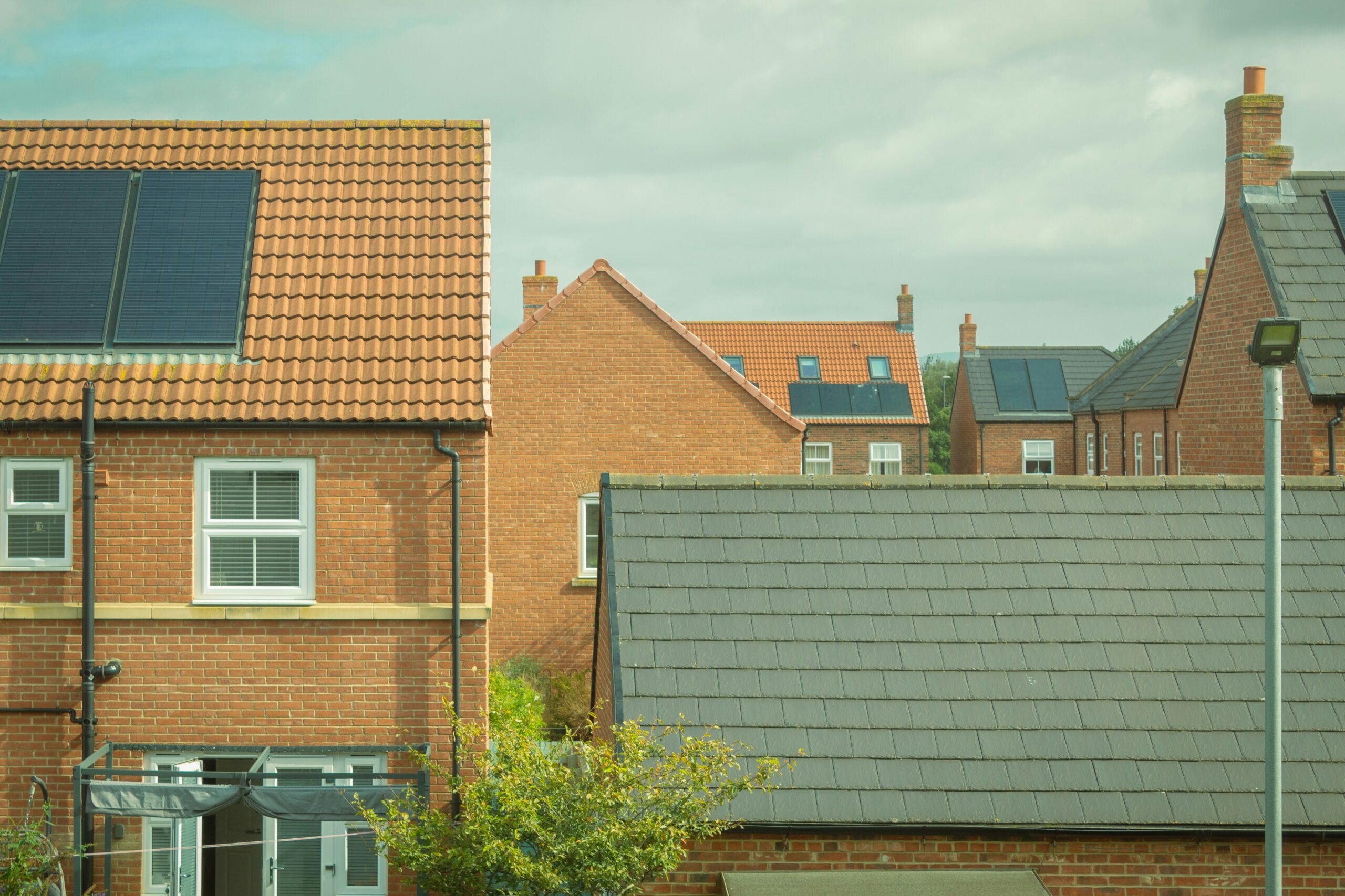 Houses with solar panels on roof