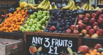 bunches of fruits for sale on a stall