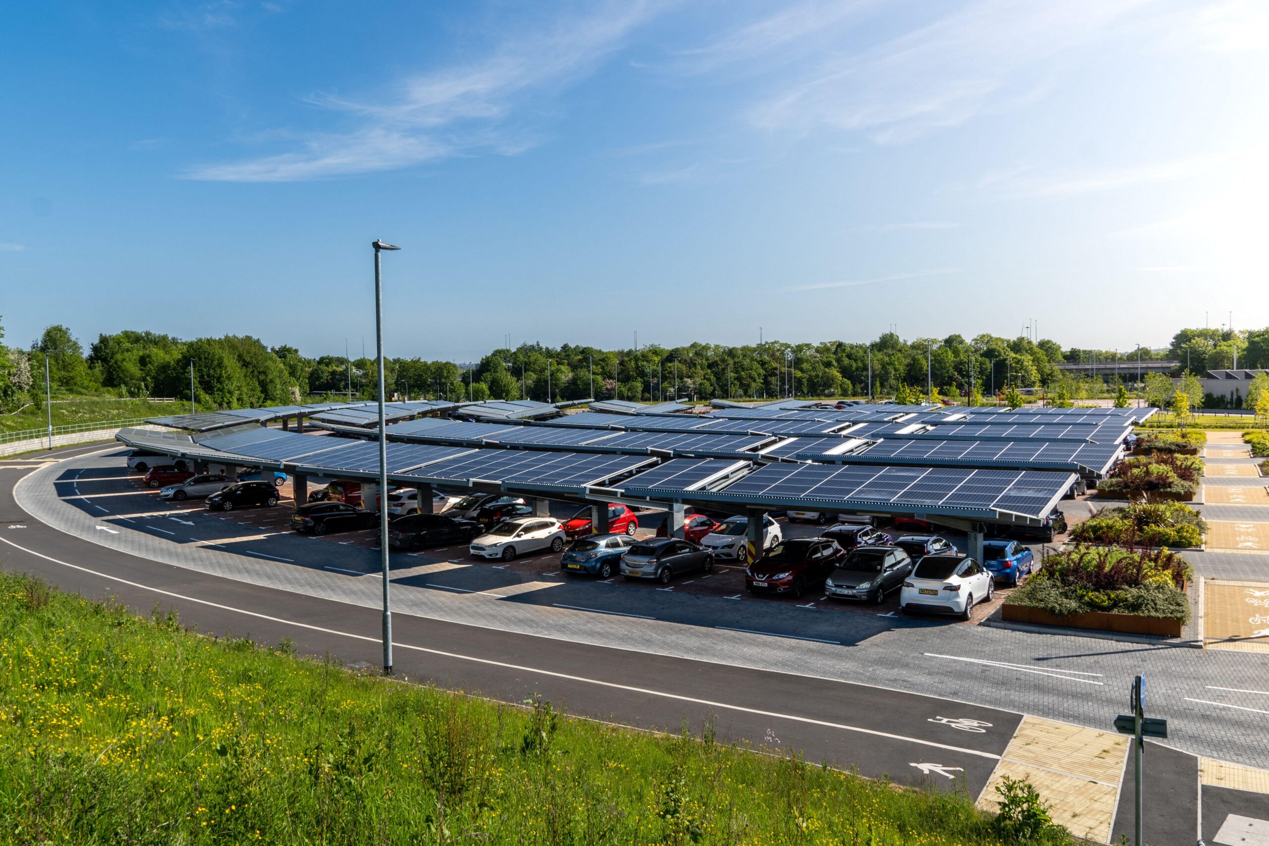 A self sufficient parking lot with park and ride facilities and solar panels for electric car charging in an innovative tec
