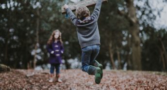 Children playing in woods