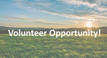 A picture of the countryside with the words 'Volunteer Opportunity' across the picture.