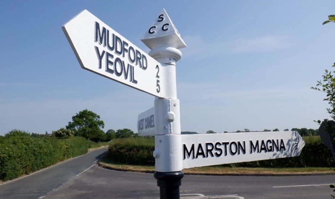 black and white fingerpost roadsign