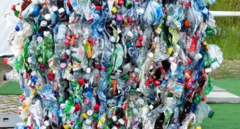 plastic bottles crushed into a cube